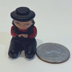 Tiny Miniature Cast Iron Sitting Man Figure